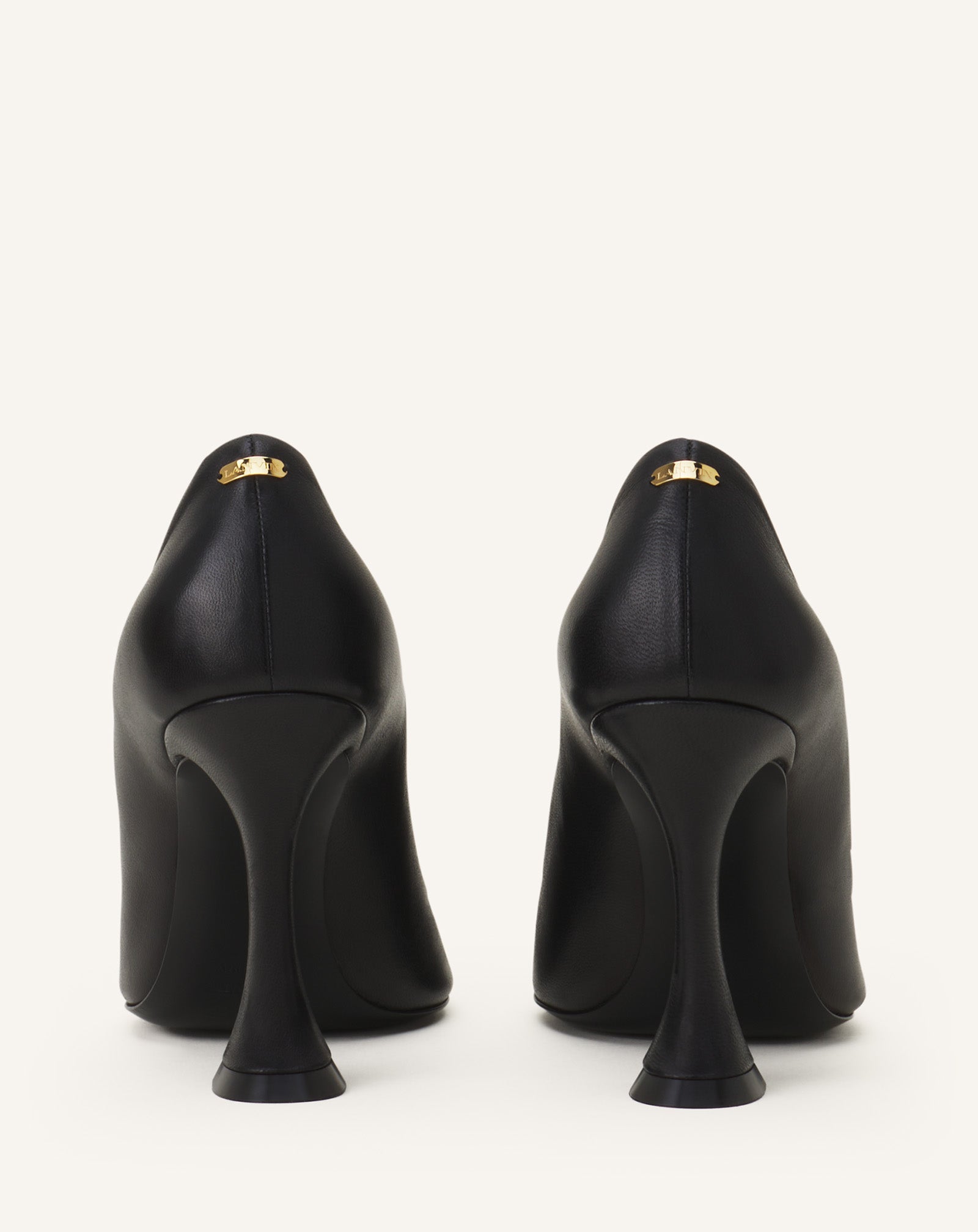 MIDNIGHT STEP LEATHER BOW PUMP