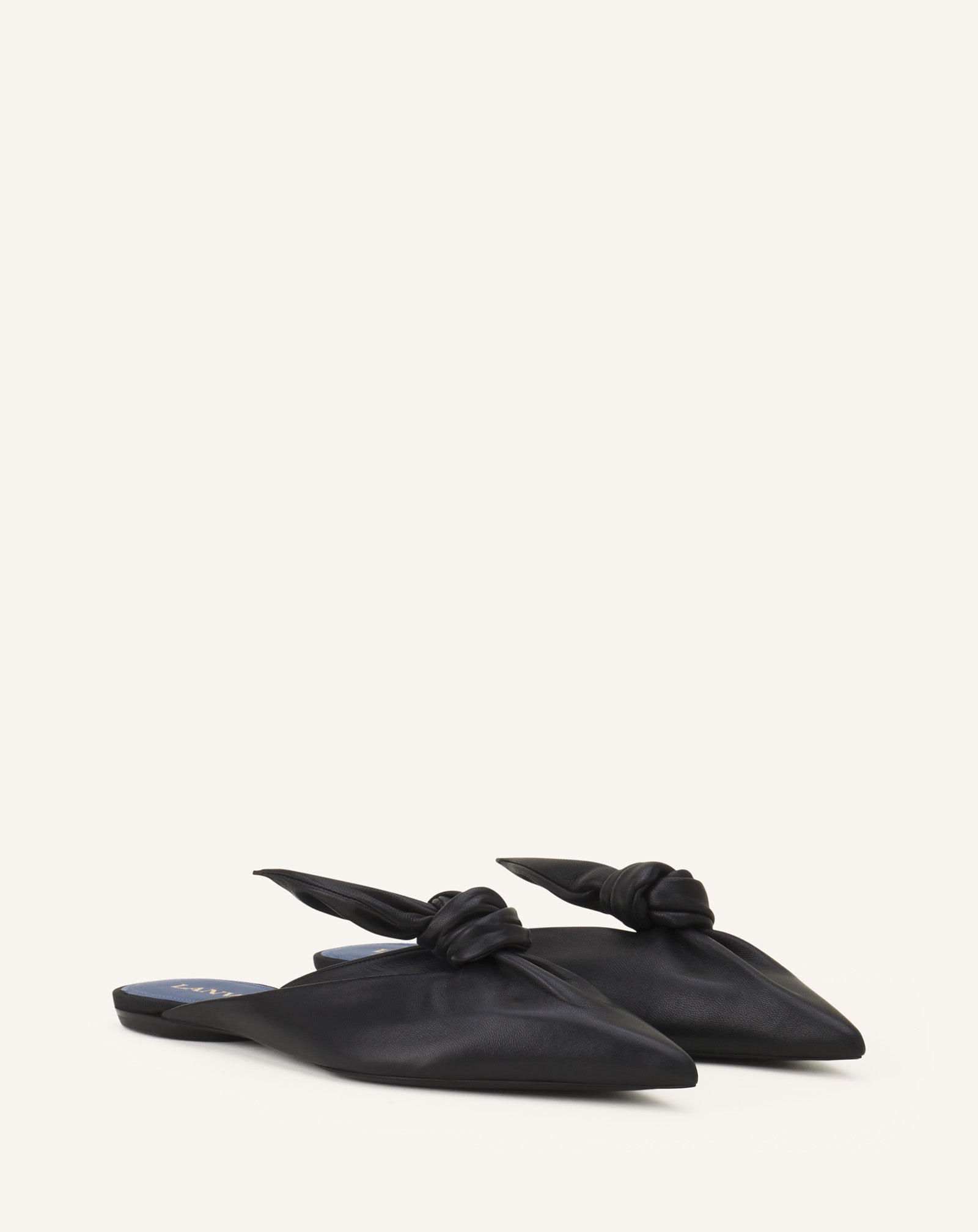MIDNIGHT STEP MULE WITH A LEATHER BOW