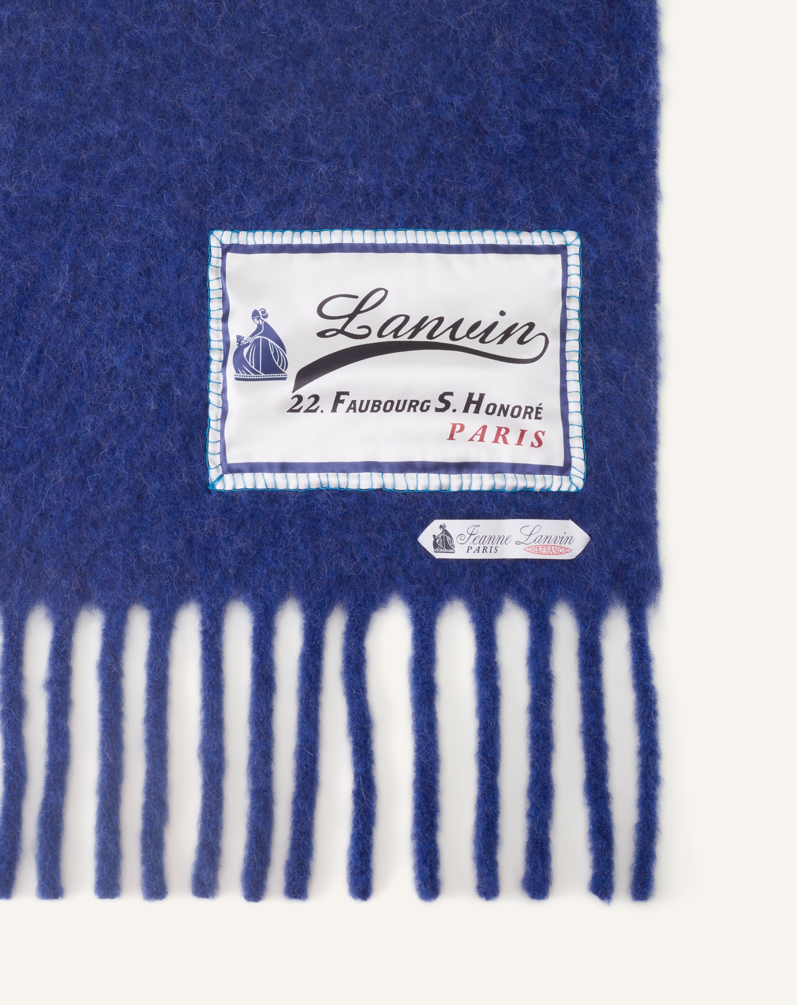 BLUE FRINGED WOOL SCARF WITH 22 FAUBOURG LABEL